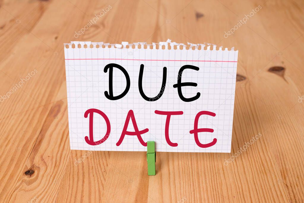 Word writing text Due Date. Business concept for the day or date by which something is supposed to be done or paid Empty reminder wooden floor background green clothespin groove slot office.