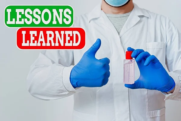 Writing note showing Lessons Learned. Business photo showcasing the knowledge or understanding gained by experience Laboratory Blood Test Sample Shown For Medical Diagnostic.