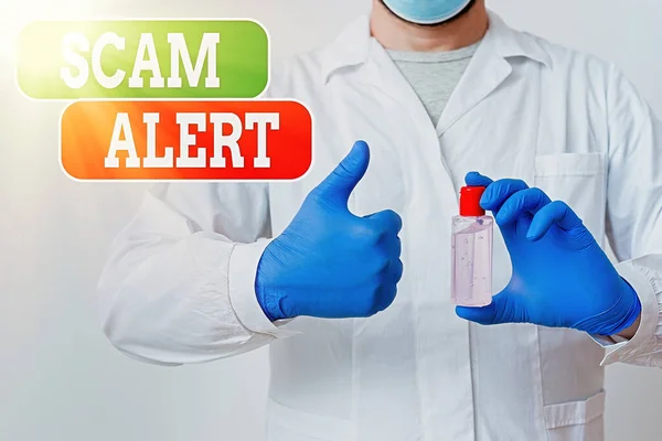 Writing note showing Scam Alert. Business photo showcasing unsolicited email that claims the prospect of a bargain Laboratory Blood Test Sample Shown For Medical Diagnostic.