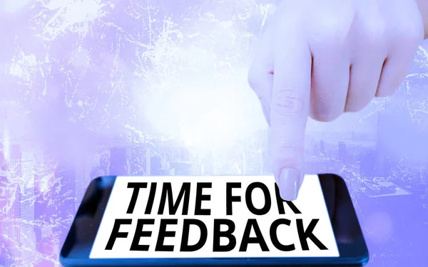 Conceptual hand writing showing Time For Feedback. Business photo text information about reactions to a product or services Modern gadgets white screen under colorful bokeh background.