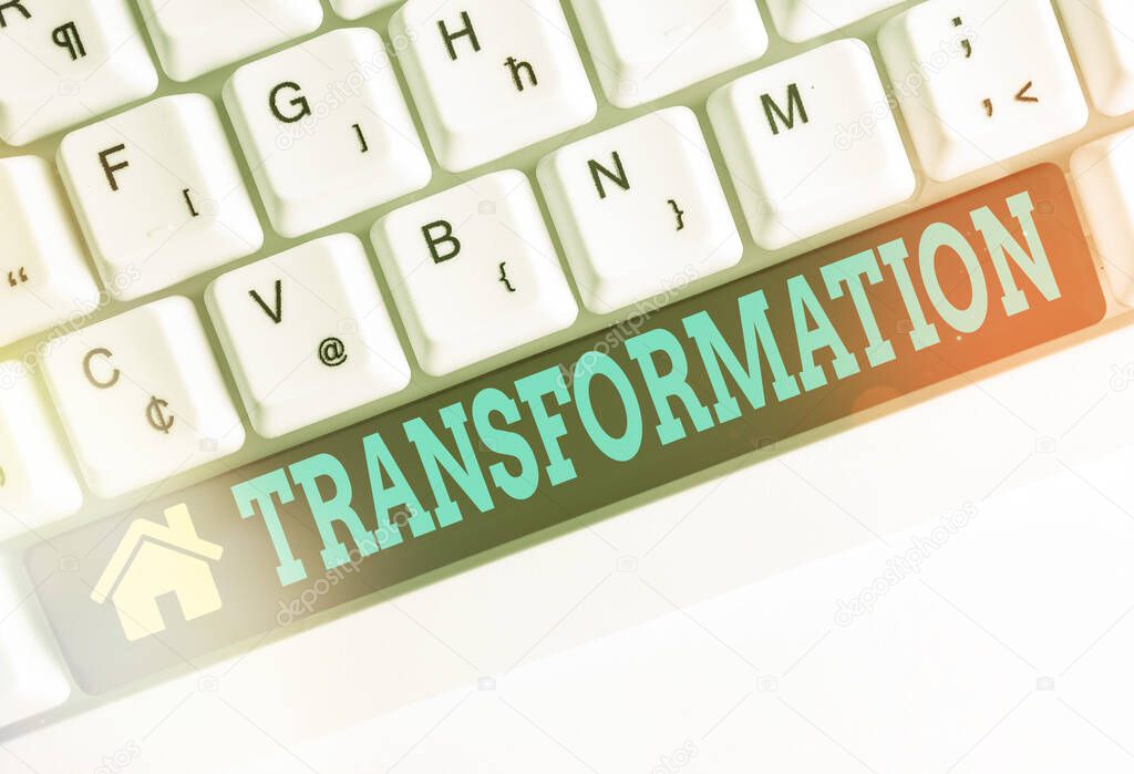 Text sign showing Transformation. Conceptual photo process, or instance of transforming or being transformed Different colored keyboard key with accessories arranged on empty copy space.