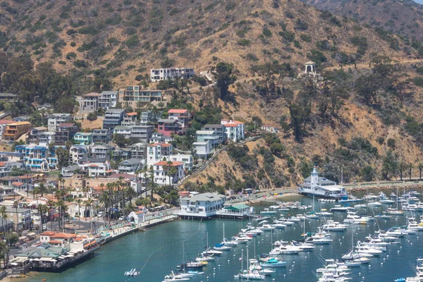 Overhead wide angle view bay view of Avalon harbor with casino, yacht club, sailboats and yachts on Santa Catalina island vacation in California