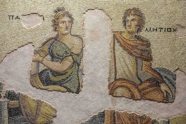 Gaziantep, Turkey - June 07, 2014: Metiochus and Parthenope Mosaic in Gaziantep Zeugma Mosaic Museum on June 07, 2014. Zeugma Mosaic Museum in Gaziantep, Turkey is one of the largest mosaic collection of the world. clipart