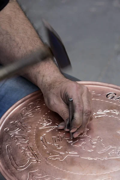 Copper try decoration by hand in Gaziantep, Turkey.