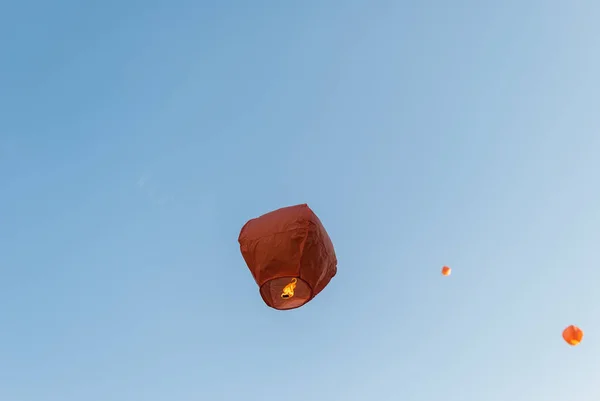 Red paper lantern, flying in the sky — Stock Photo, Image