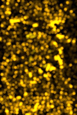 soyut ve şenlikli altın bokeh arka plan, bulanık ışıklar