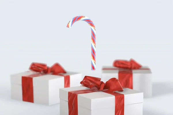 Рождественские новогодние красочные подарочные коробки с бантами лент и обнаженной леденцовой тростью на белом фоне. 3d иллюстрация с пробелами для текста — стоковое фото