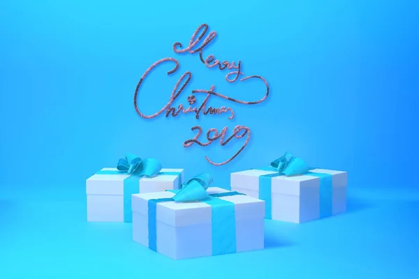 Feliz Navidad 2019 letras escritas en la pared de color azul de moda y tres cajas de regalo presentes con lazos al lado. ilustración 3d —  Fotos de Stock
