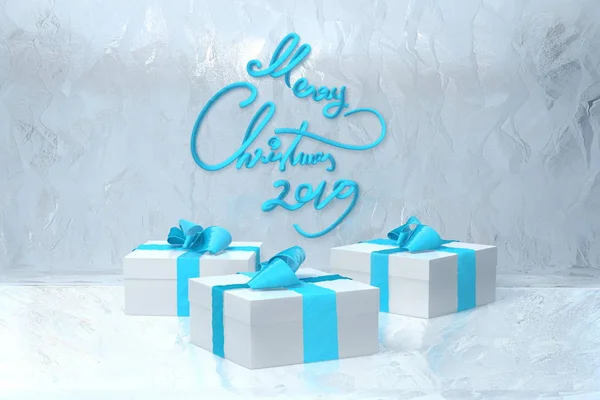 Feliz Navidad 2019 letras escritas por cinta azul en la pared nevada de hielo y tres cajas de regalo presentes con lazos al lado. ilustración 3d —  Fotos de Stock