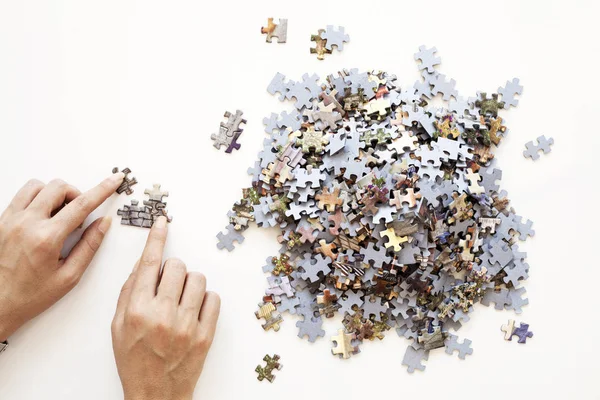 Person Hands Unfinished Color Puzzle Pieces White Background Business Concept — Stock Photo, Image