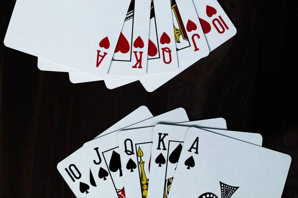 royal flush. playing cards on black background