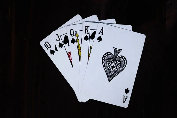 royal flush on black background