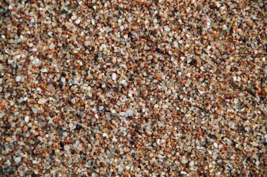 Arka plan olarak deniz kumu. çakıl taşı arkaplanı.