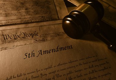 Text of the Fifth Amendment to the US Constitution and gavel clipart