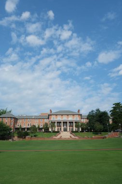 RALEIGH,NC/USA - 8-14-2018:  NC State University campus in front of the 1911 building                                clipart