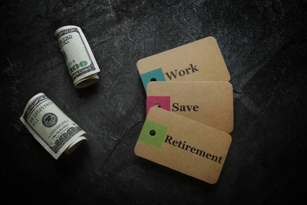 Work Retirement Paper Tags Hundred Dollar Bills Dark Background — Stock Photo, Image