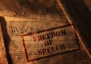 Freedom of Speech stamp on pages of the United States Constitution                       clipart