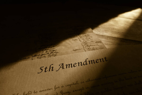 Closeup of text from the Fifth Amendment of the US Constitution                               