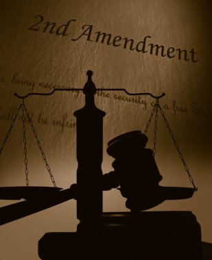 Court gavel and scales of justice silhouette with 2nd Amendment of the US Constitution text clipart