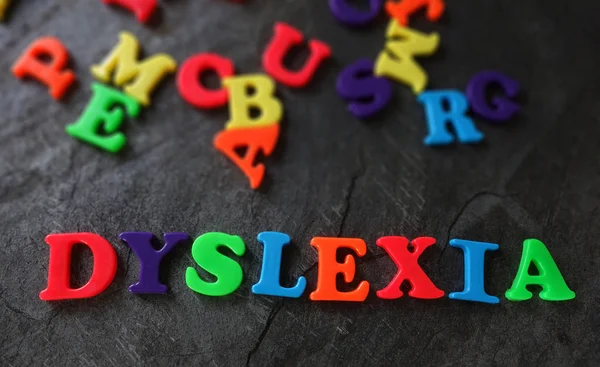 Dyslexia in play letters — Stock Photo, Image