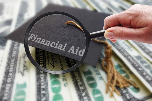 Magnify Financial Aid — Stock Photo, Image