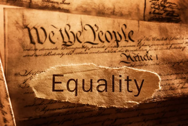 Equality news headline on US Constitution with We The People text -- equal rights concept