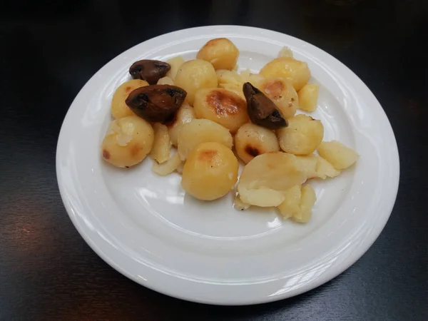 Vegan English breakfast with roasted potatoes and mushrooms