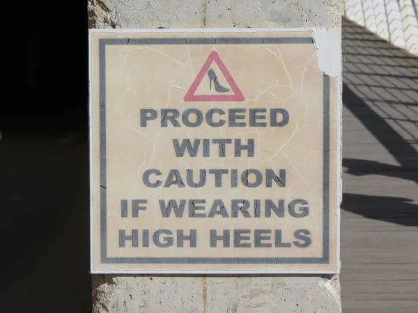 Proceed with caution if wearing high heels — Stock Photo, Image