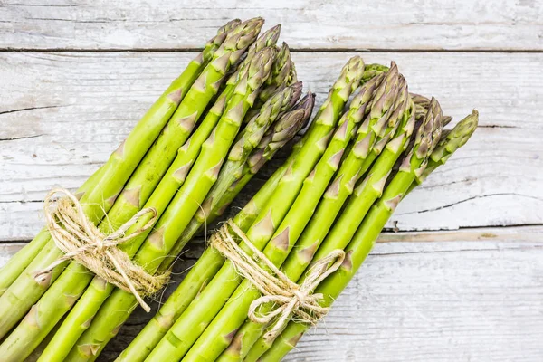 Fresh Raw Green Asparagus Bunches Wooden Background — Stock Photo, Image