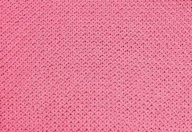 Sorunsuz bej Triko Kumaş dokulu ve Pigtails. Yinelenen doku kazak örgü makinesi. Arka plan bej örme.