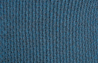 Sorunsuz bej Triko Kumaş dokulu ve Pigtails. Yinelenen doku kazak örgü makinesi. Arka plan bej örme.