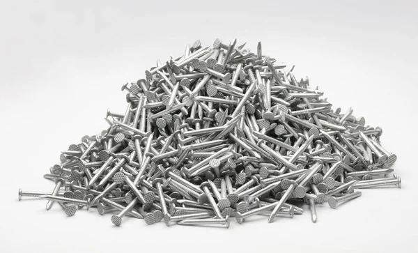Pile Metal Nails White Background Construction Equipment Steel — Stock Photo, Image