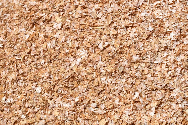 Tekstur latar belakang benih hancur dan campuran biji-bijian untuk ternak dan pakan burung — Stok Foto