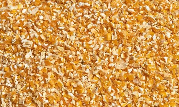 Background texture of crushed seed and grain mix for livestock and bird feed — Stock Photo, Image