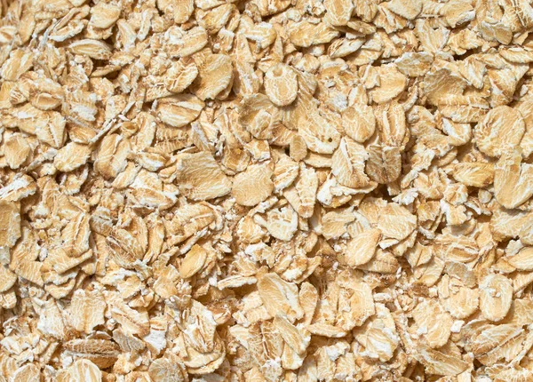 Background texture of crushed seed and grain mix for livestock and bird feed — Stock Photo, Image