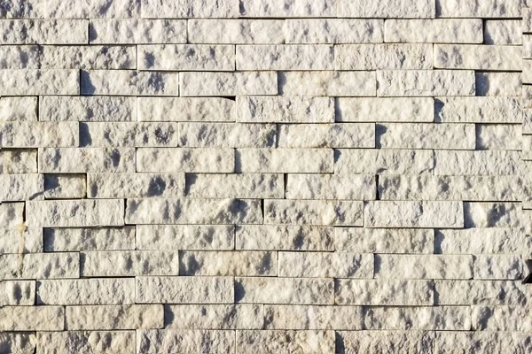 Stenen achtergrond. Achtergrond textuur van een stenen en marmeren muur. — Stockfoto