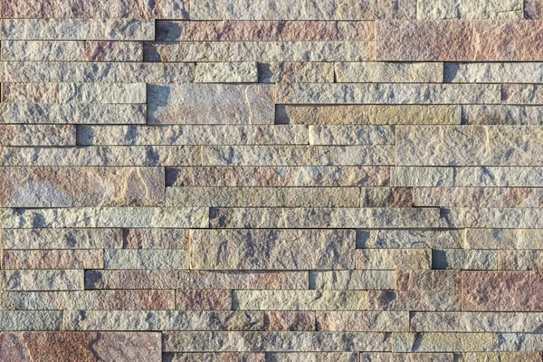 Fragmento de uma parede feita de pedra. Parede de pedra . — Fotografia de Stock