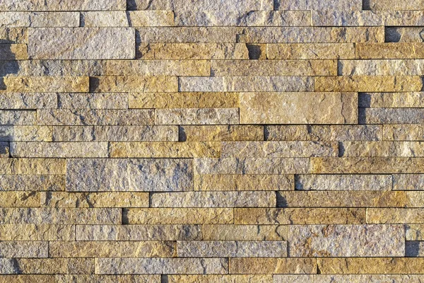 Fragmento de un muro de piedra. Pared de piedra . — Foto de Stock