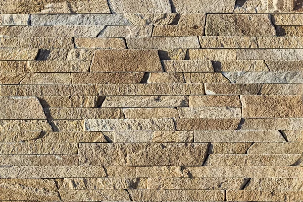 Fragmento de un muro de piedra. Pared de piedra . —  Fotos de Stock