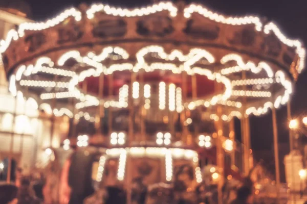 Image Rue Floue Avec Lumières Festives Carrousel Dans Nuit Flou — Photo