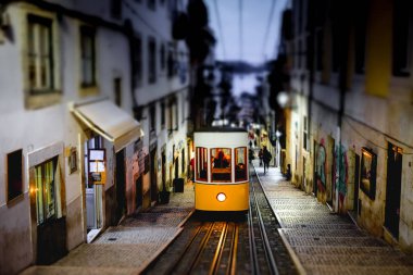 The Bica Funicular, Ascensor da Bica, Traditional yellow tram in Lisbon, Portugal clipart
