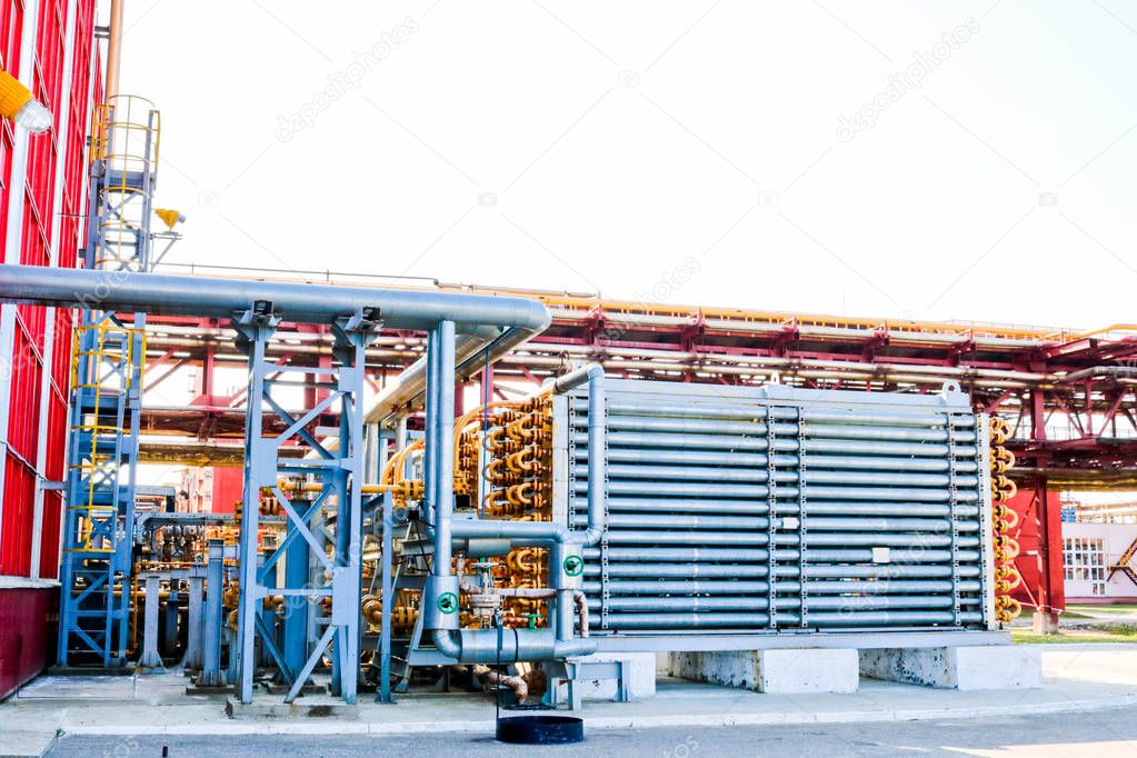 blue tubular reactor, a pipe-type heat exchanger in a pipe to produce high-pressure polyethylene at an oil refinery, petrochemical, chemical plant
