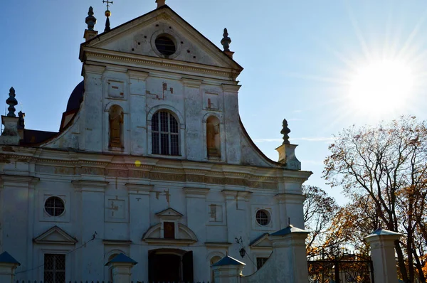 Old ancient white poor stone shabby Christian Orthodox church with crosses — Stock Photo, Image