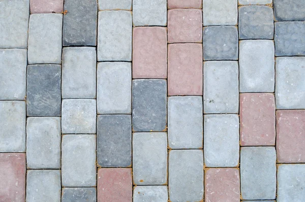 Textur Aus Grauen Rechteckigen Betonsteinpflasterplatten Auf Der Straße Mit Nähten — Stockfoto