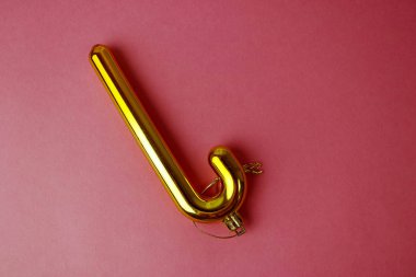 Renkli altın sarı Plastik kış parlak Noel dekoratif güzel xmas şenlikli Noel ağacı şeker kamışı kırmızı pembe bir arka plan üzerinde