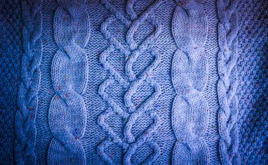 Konu bir örgü deseni ile güzel doku yumuşak sıcak doğal kazak. Arka plan
