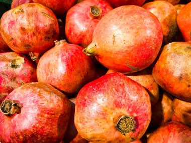 Güzel kırmızı olgun Güney doğal vitamini lezzetli olgun oryantal parlak bombası. Doku, arka plan