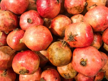 Güzel kırmızı olgun Güney doğal vitamini lezzetli olgun oryantal parlak bombası. Doku, arka plan