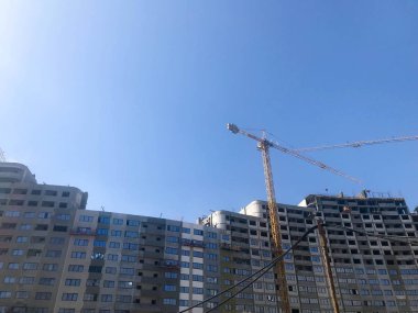 Yüksek betonarme, panel, dökme çerçeve, çerçeve blok evler, binalar, gökdelenler, yeni binalar inşaat vinç yardımıyla bina