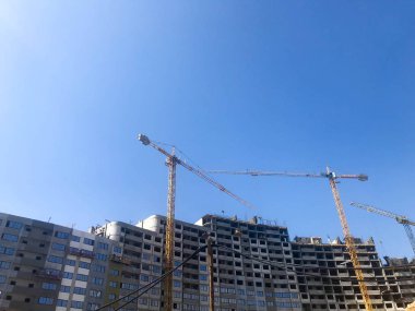Yüksek betonarme, panel, dökme çerçeve, çerçeve blok evler, binalar, gökdelenler, yeni binalar inşaat vinç yardımıyla bina